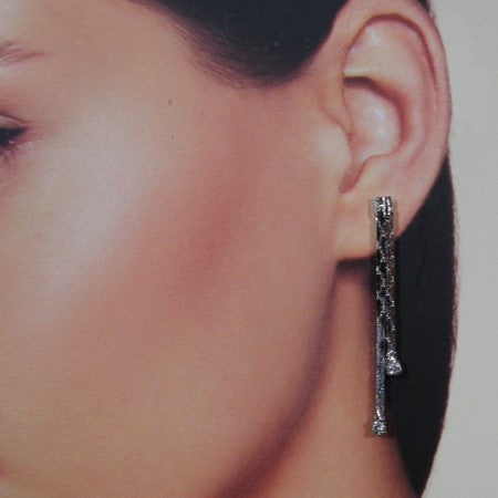 Long earring with cobra chain and small rhinestones