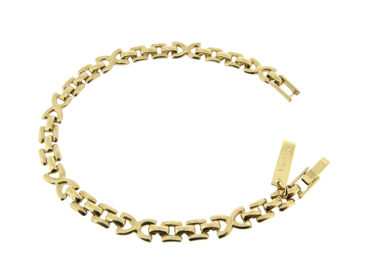 Golden bracelet with stylish links and butterfly clasp