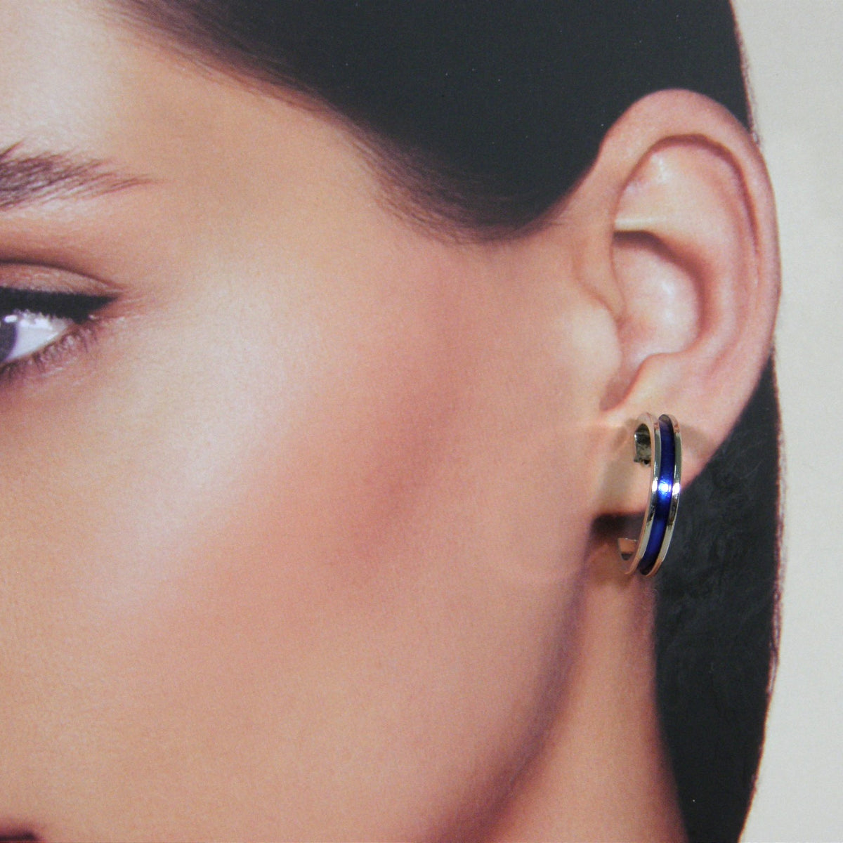 Small silver French hoop earring with blue inlaid enamel