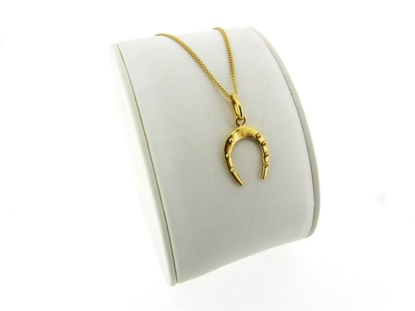 Goldene Kette mit Glückshufeisen-Anhänger